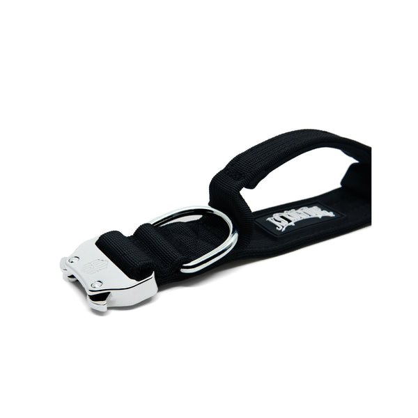 K9-TAC Onyx Black dog collar laid flat, showing metal buckle, D-ring, and padded handle loop.