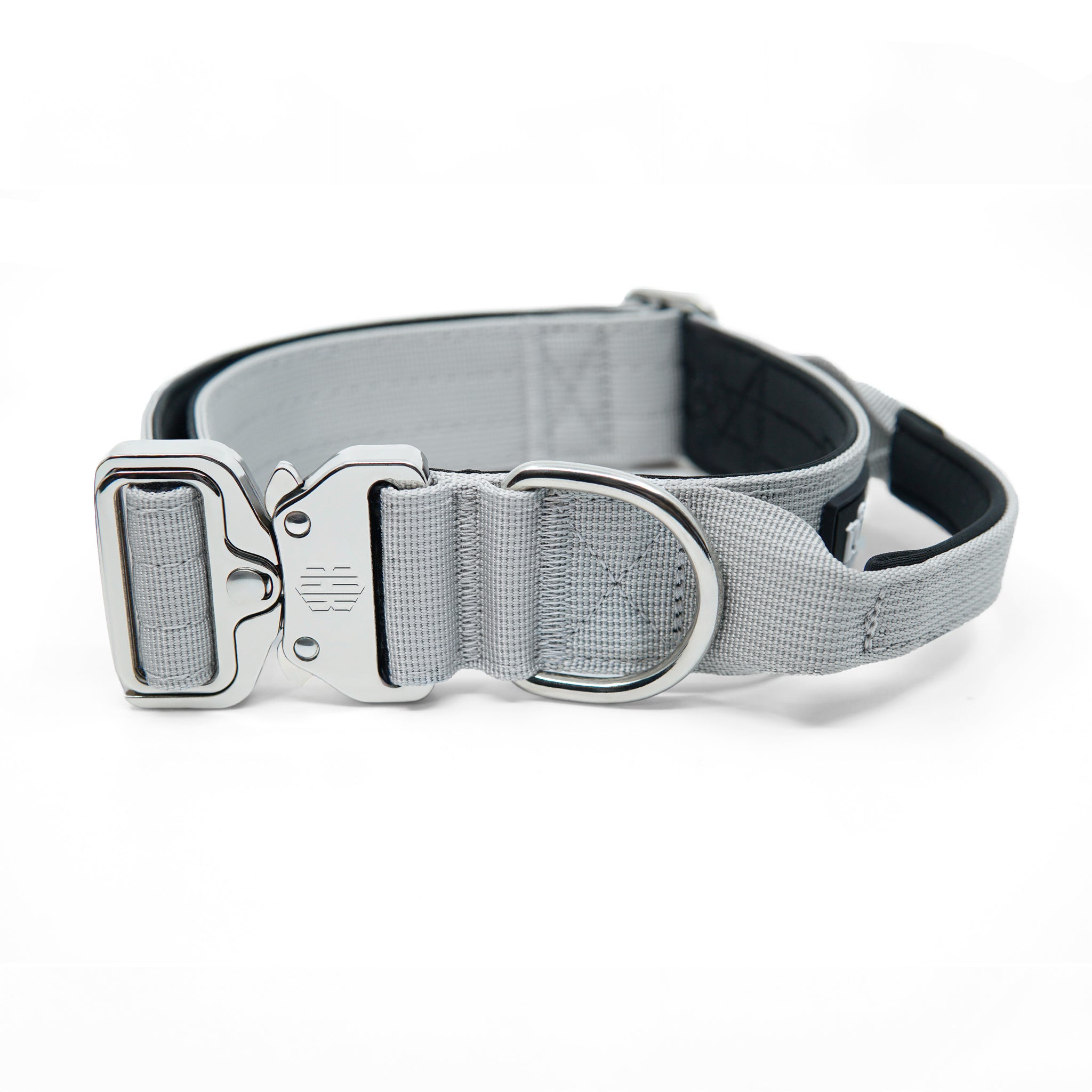 K9-TAC Storm Grey heavy-duty dog collar with secure metal buckle, wide black webbing, and strong D-ring.