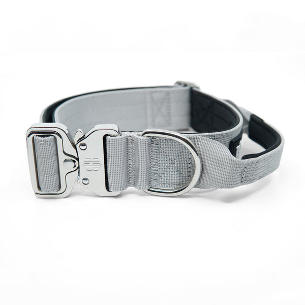 K9-TAC Storm Grey heavy-duty dog collar with secure metal buckle, wide black webbing, and strong D-ring.
