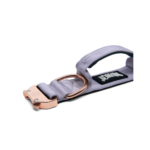 K9-TAC Violet Purple dog collar laid flat, showing metal buckle, D-ring, and padded handle loop.